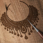 1074_Beaded_Necklace_3335-transparent-wood_etching_1.jpg