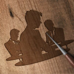 1295_Businessman_in_a_meeting_1701-transparent-wood_etching_1.jpg