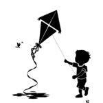 Child Playing with Kite