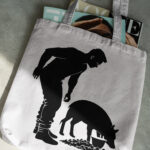 325_Pig_farmer_feeding_slop_2846-transparent-tote_bag_1.jpg