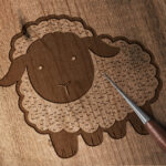 331_sheep_with_a_playful_expression_and_fluffy_wool_4639-transparent-wood_etching_1.jpg