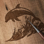 375_Dolphin_jumping_in_the_ocean_7529-transparent-wood_etching_1.jpg