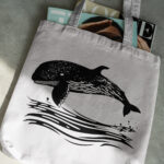 377_Whale_swimming_in_the_ocean_3374-transparent-tote_bag_1.jpg