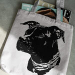 414_American_Pit_Bull_Terrier_with_a_bandana_9896-transparent-tote_bag_1.jpg