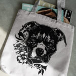 420_American_Staffordshire_Terrier_with_a_skull_bandana_4349-transparent-tote_bag_1.jpg