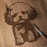 443_Bichon_Frise_with_a_ribbon_5109-transparent-wood_etching_1.jpg