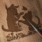 509_Kitten_and_puppy_playing_together_3556-transparent-wood_etching_1.jpg