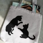 511_Kitten_and_puppy_playing_together_6528-transparent-tote_bag_1.jpg