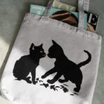 515_Kitten_and_puppy_playing_together_2849-transparent-tote_bag_1.jpg