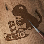 627_Ferret_playing_with_a_toy_8701-transparent-wood_etching_1.jpg