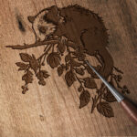 696_opossum_hanging_from_a_branch_2858-transparent-wood_etching_1.jpg